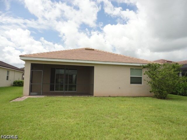 Property Photo:  16023 Mistflower Drive  FL 33920 
