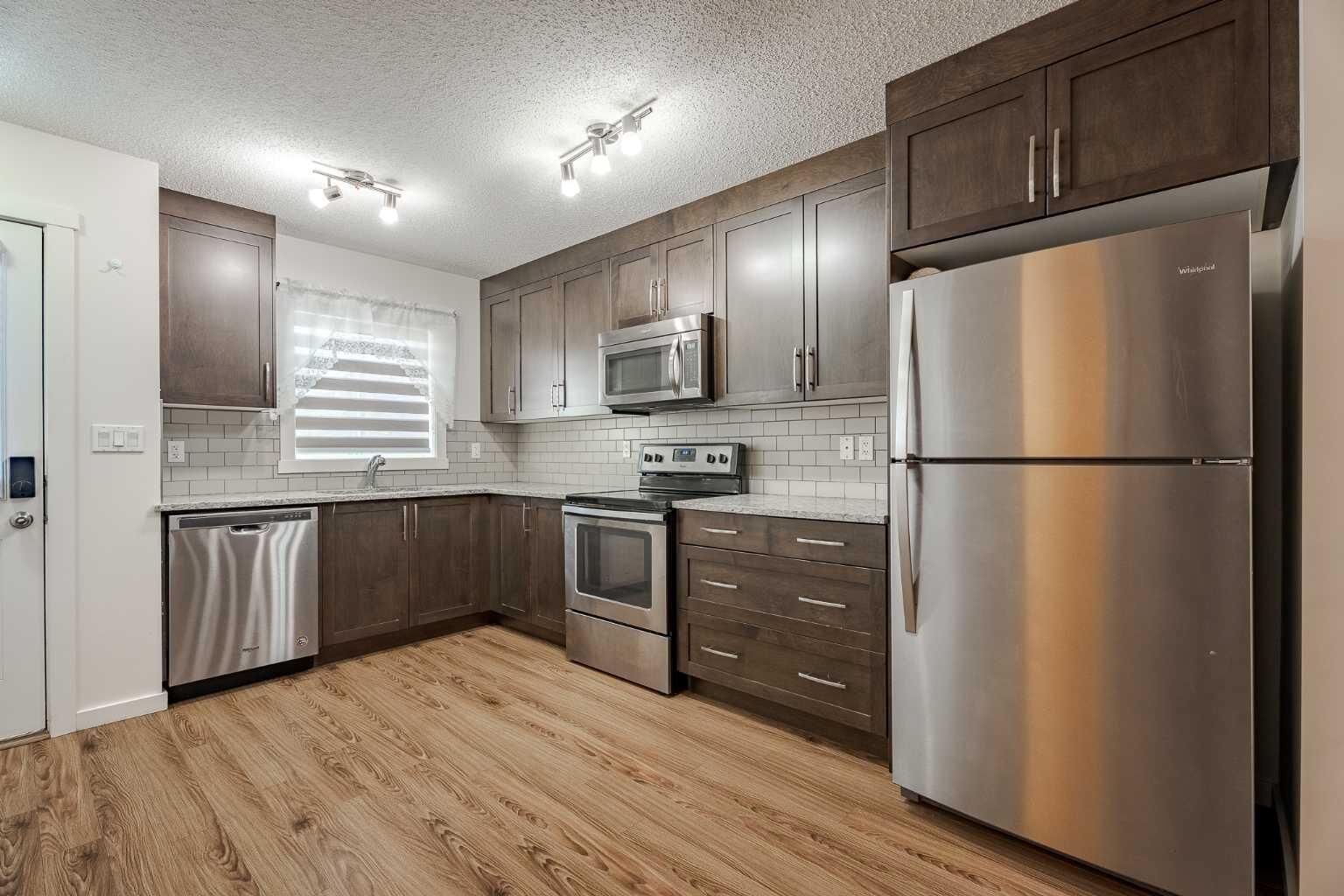 Property Photo:  2400 Ravenswood View SE 202  AB T4A 0V7 