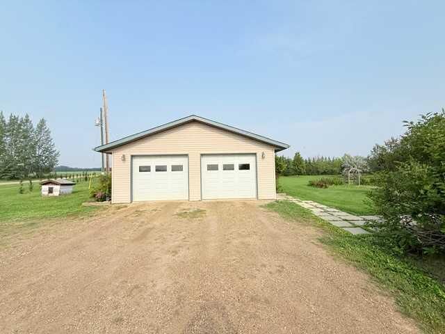 Property Photo: 861023 RR 214 AB T8S 1S5