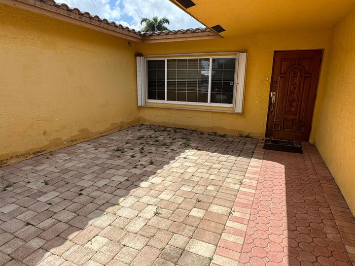 Property Photo:  2180 NW 93rd Avenue  FL 33024 