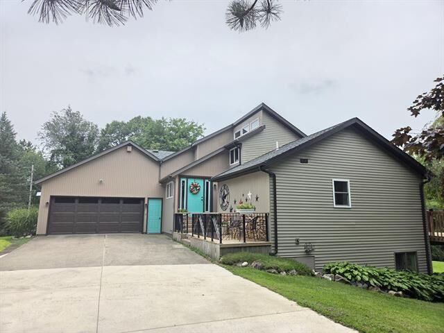 Property Photo:  10335 Lincoln Lake Road NE  MI 48838 
