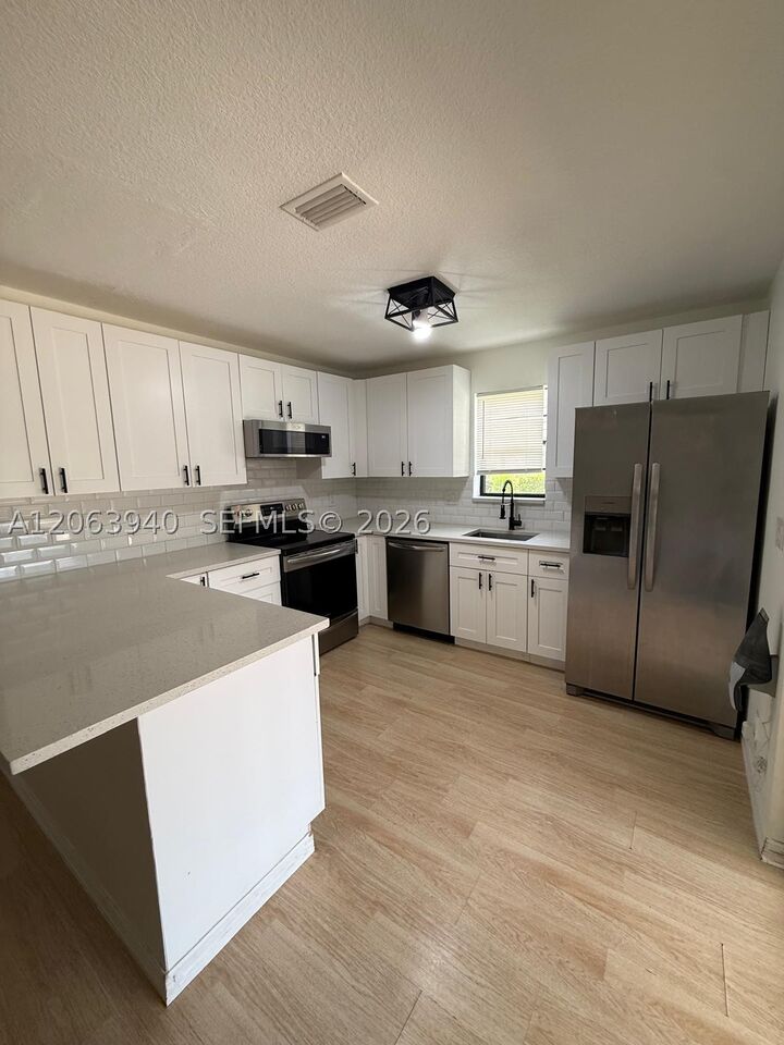 Property Photo:  2551 NW 99th Ave 2551  FL 33065 