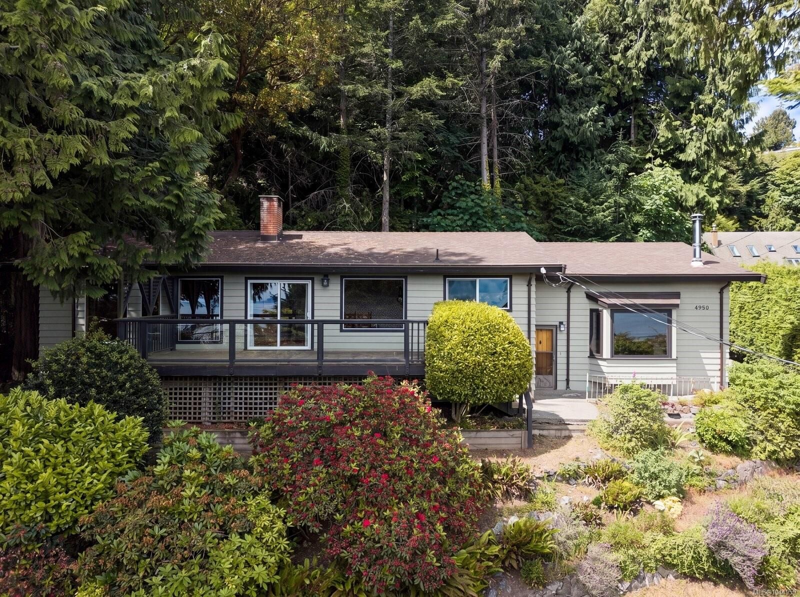 Property Photo:  4950 Lochside Dr  BC V8Y 2E4 