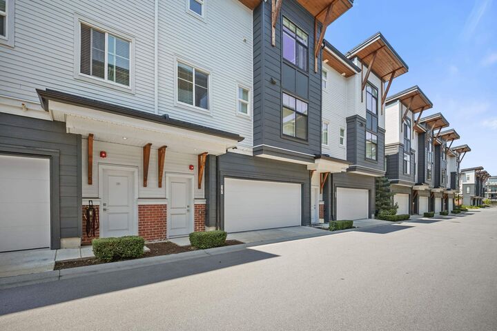 Property Photo: 22128 48A Avenue 27 BC V3A 0L6