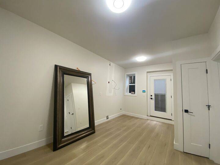 Property Photo:  7542 Lindrick Court 1 Bed Suite  BC V5A 3Y5 