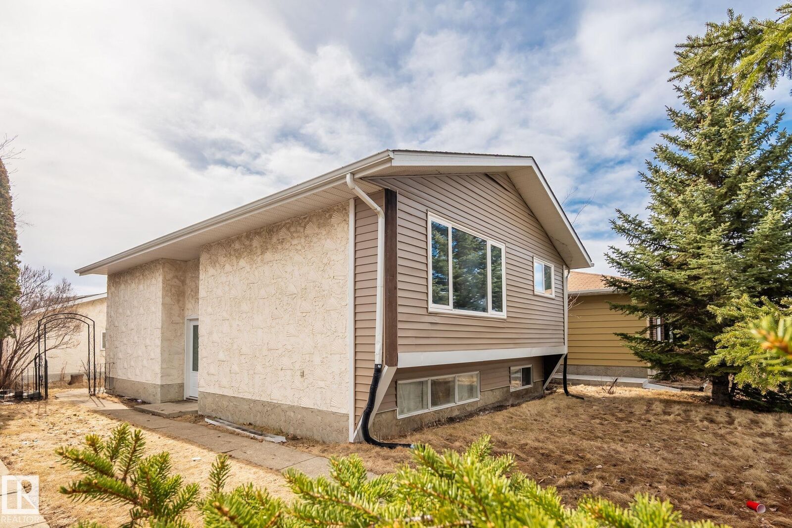 Property Photo: 1566 Lakewood Road NW AB T6K 2V9