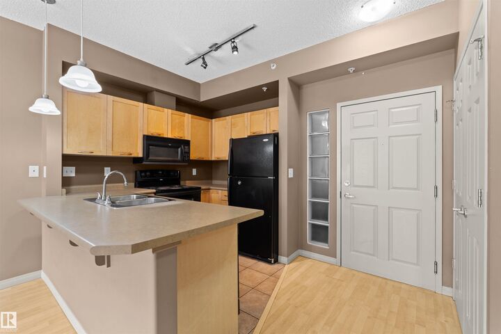 Property Photo: 4245 139 Avenue NW 1-516 AB T5Y 3E8