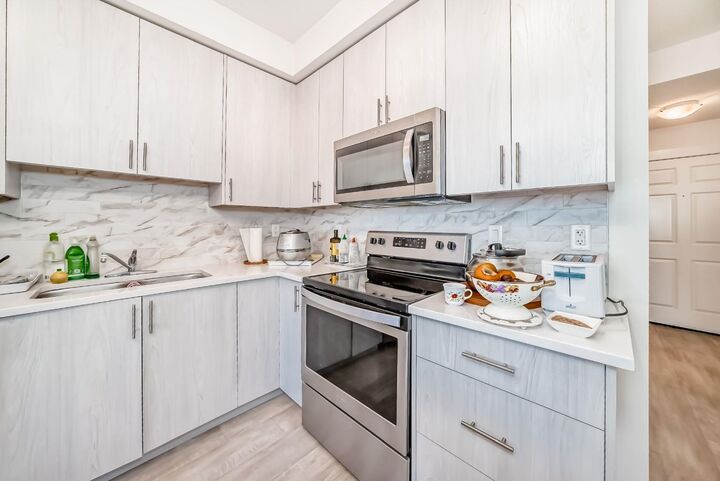 Property Photo:  298 Sage Meadows Park NW 1118  AB T3P 1P5 