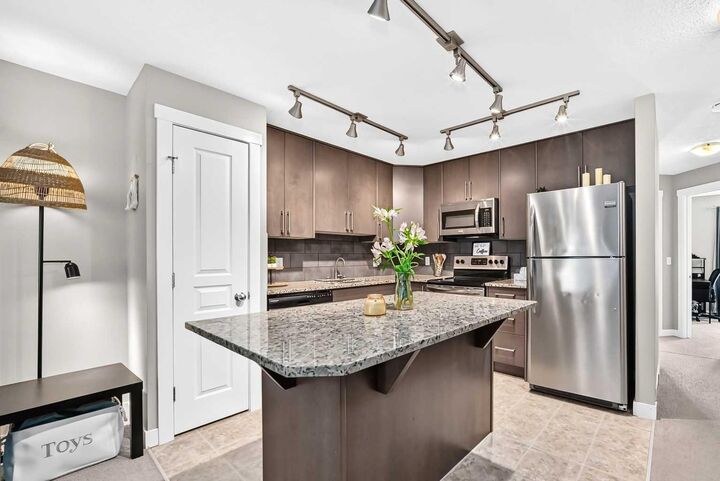 Property Photo:  154 Cranford Walk SE  AB T3M 1R5 