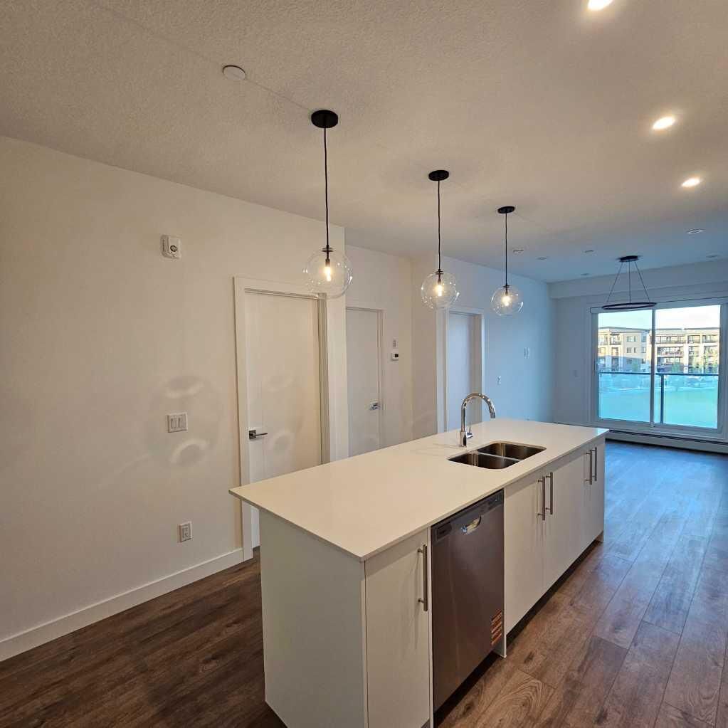 Property Photo: 265 Wolf Willow Blvd Boulevard SE AB T2X 6R2