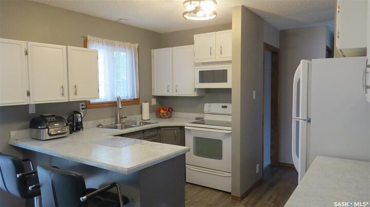 Property Photo: 1409 Duffield Street W SK S6H 5K5