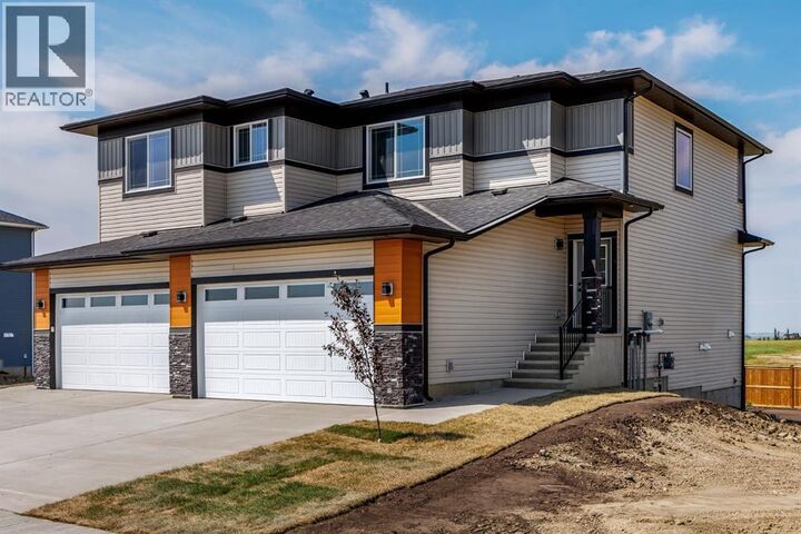 Property Photo: 140 Lakewood Crescent AB T1P 0G6