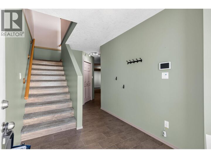 Property Photo: 6855 Domano Boulevard 104 BC V2N 5C9