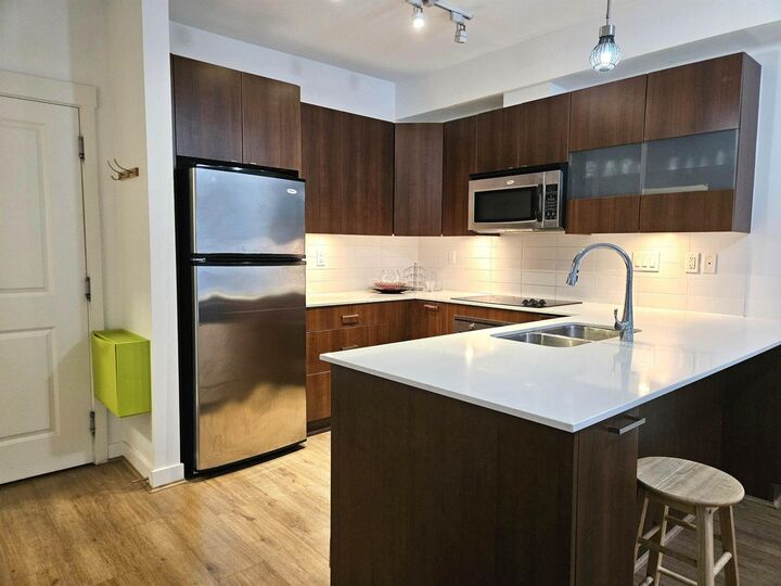 Property Photo: 13321 102A Avenue 220 BC V3T 1P6