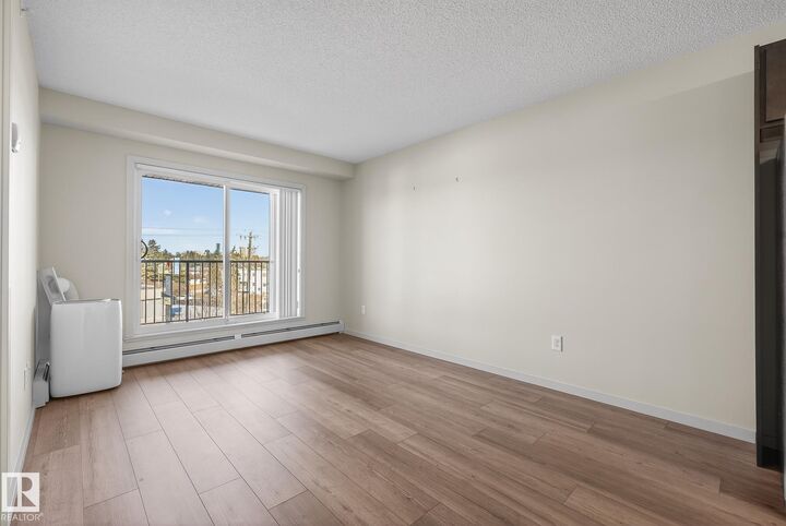 Property Photo: 7711 71 Street NW 405 AB T6B 3J3