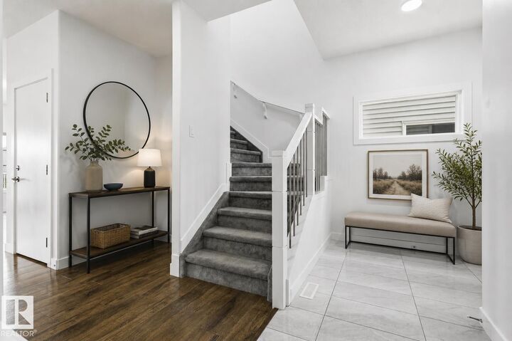 Property Photo: 7258 Chivers Place SW AB T6W 4L4