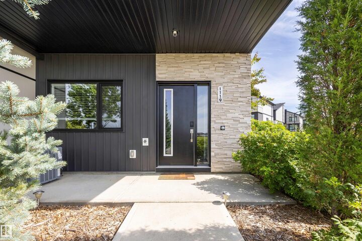 Property Photo: 1119 Keswick Drive SW AB T6W 4B6