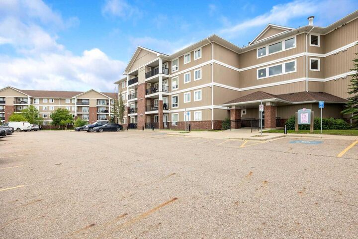 Property Photo: 248A Grosbeak Way 307 AB T9K 0V9
