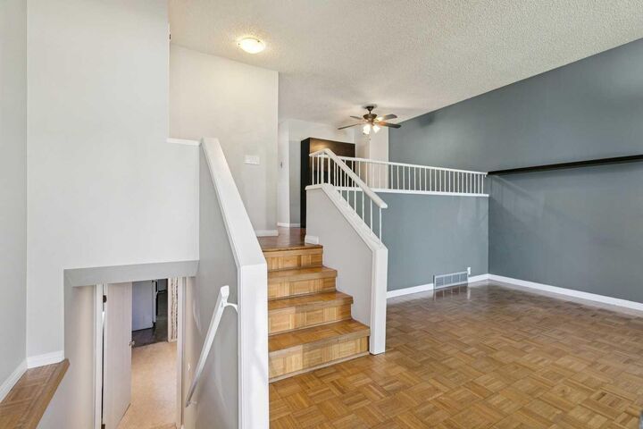 Property Photo: 3624 Cedarille Drive SW AB T2W 3X8