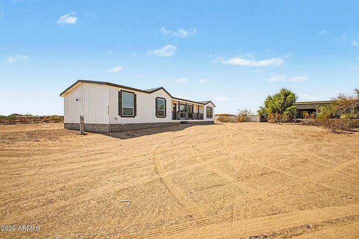 Property Photo: 27152 N 143rd Avenue AZ 85387