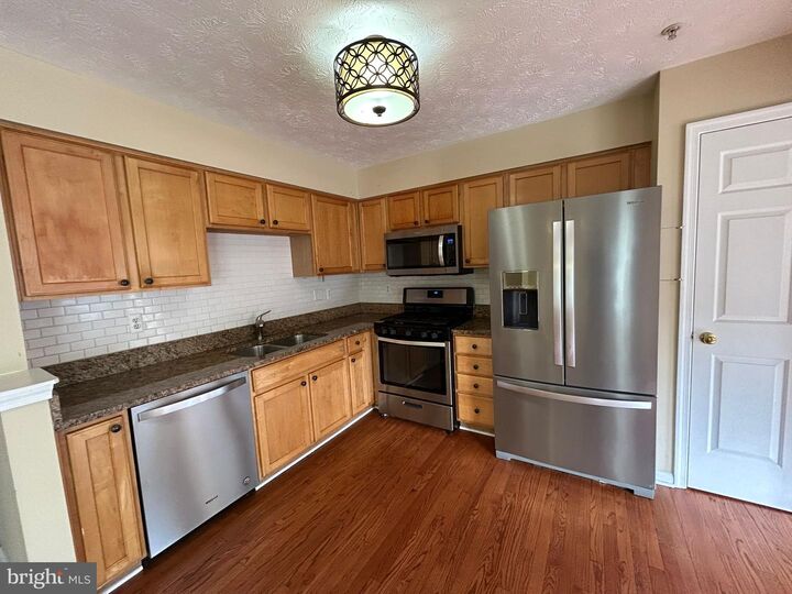Property Photo: 8718 Belleau Court MD 21043