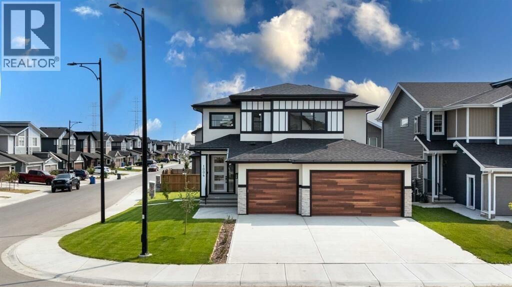 Property Photo: 1004 Waterford Drive AB T1X 2T7
