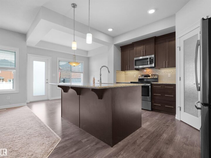 Property Photo:  428 Simpkins Link  AB T9E 1B3 