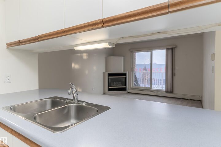 Property Photo: 4220 139 Avenue NW 306 AB T5Y 2Y2
