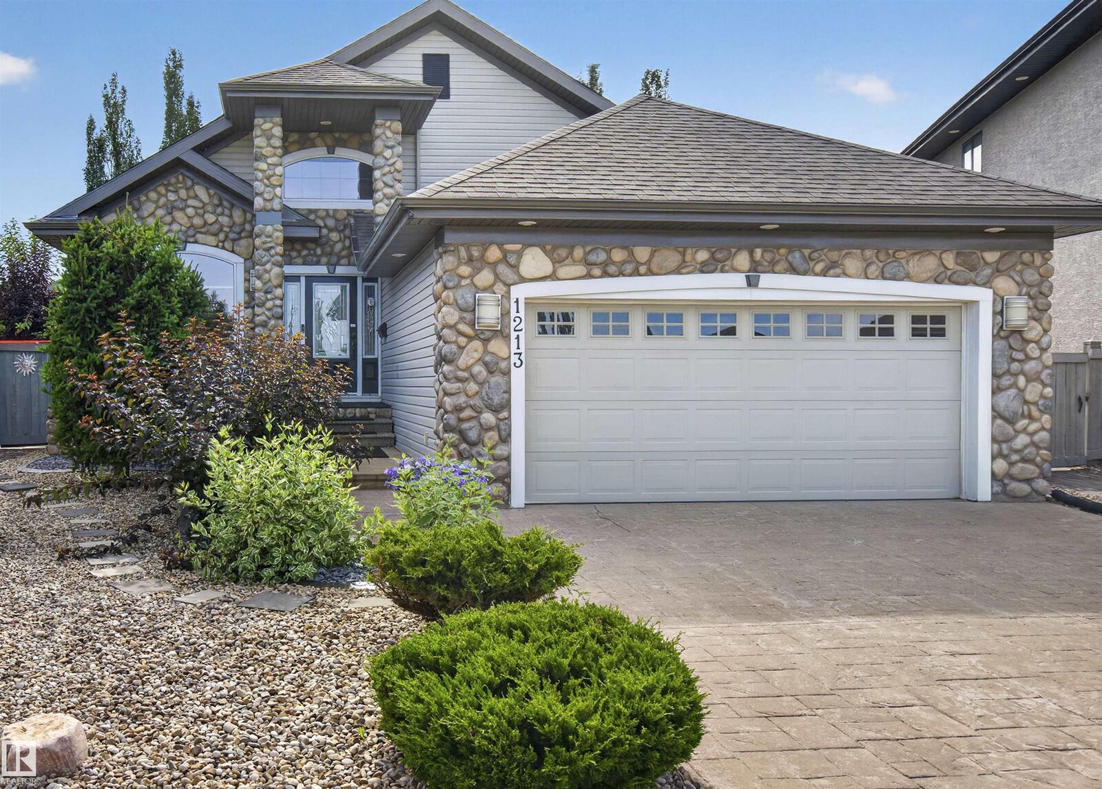 Property Photo: 1213 Cunningham Drive SW AB T6W 0R5