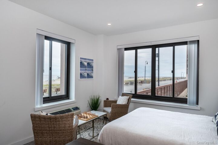 Property Photo: 100 W Broadway 1H NY 11561