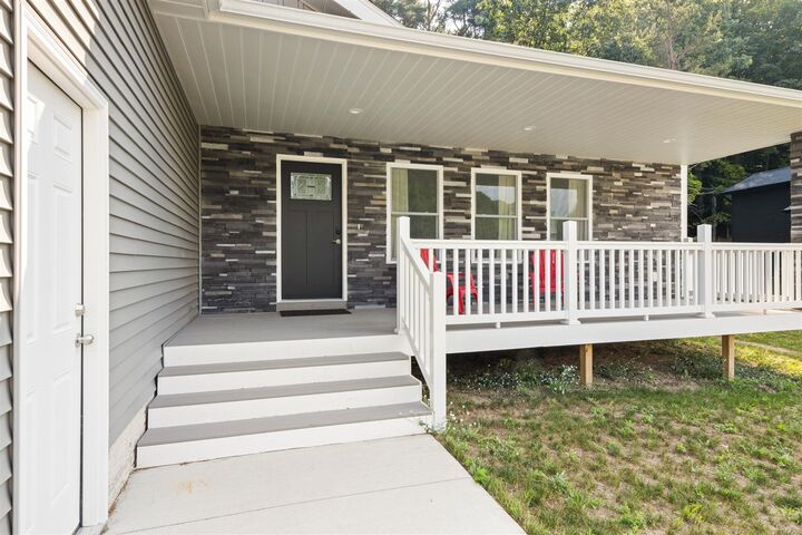 Property Photo:  1132 Farmington Drive  MI 49696-8858 