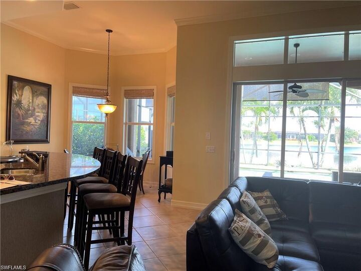 Property Photo: 6557 Caldecott Dr FL 34113