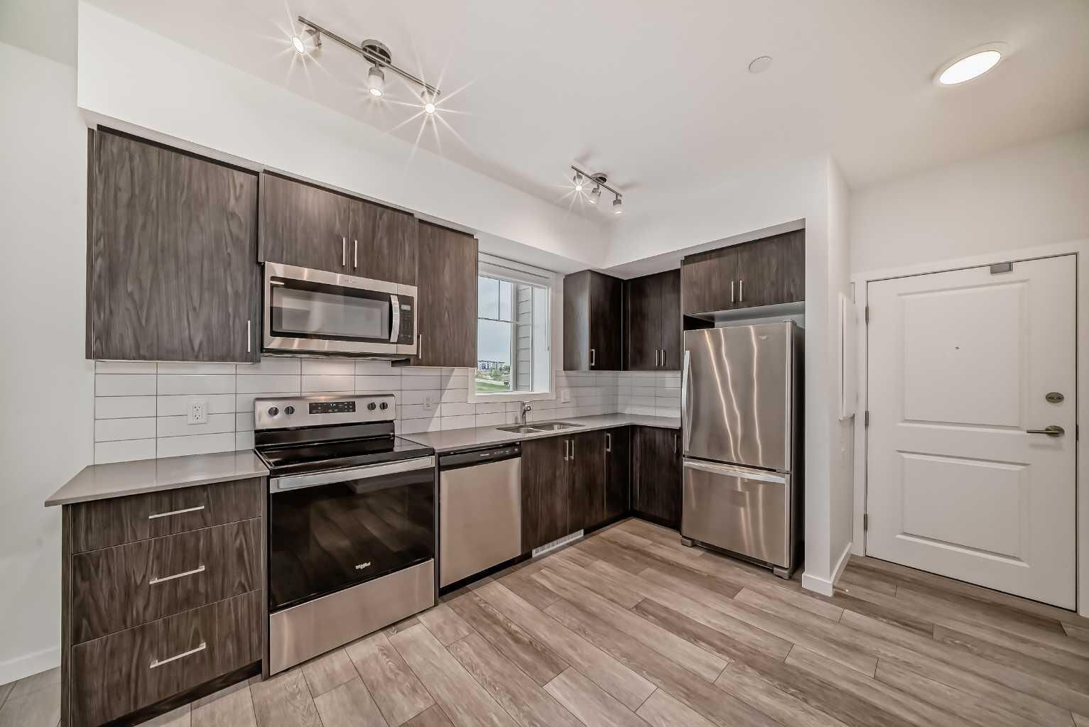 Property Photo:  3727 Sage Hill Drive NW 3204  AB T3R 1T7 