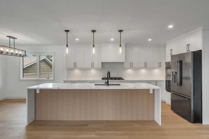 Property Photo: 816 Lake Ontario Drive SE AB T2J 3J9