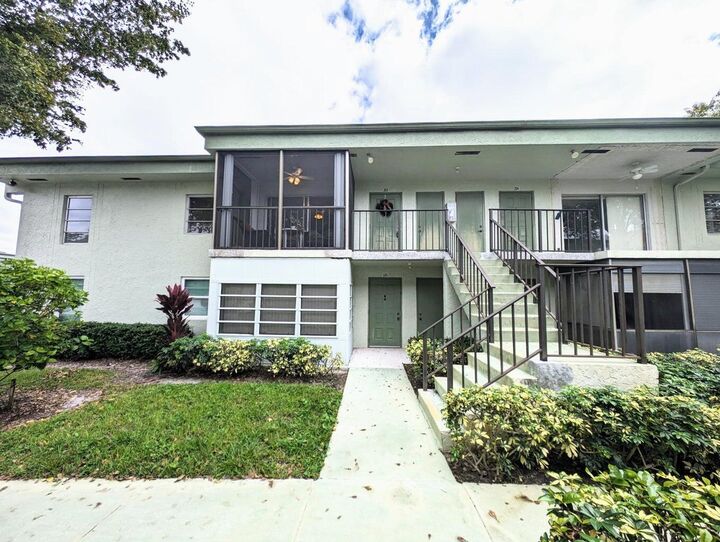 Property Photo: 7515 S Oriole Boulevard 203 FL 33446