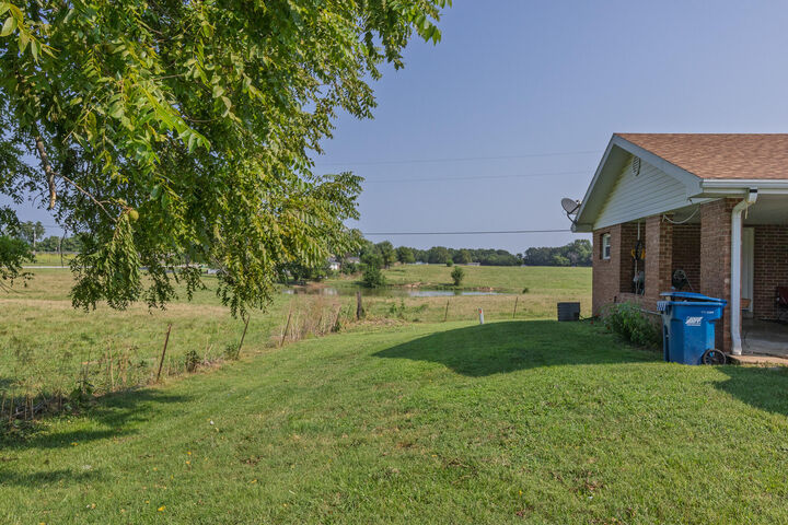 Property Photo: 7053-7057 W Farm Road 106 MO 65803
