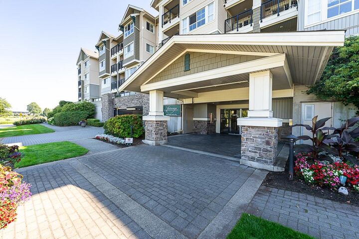 Property Photo: 19673 Meadow Gardens Way 207 BC V3Y 0A1