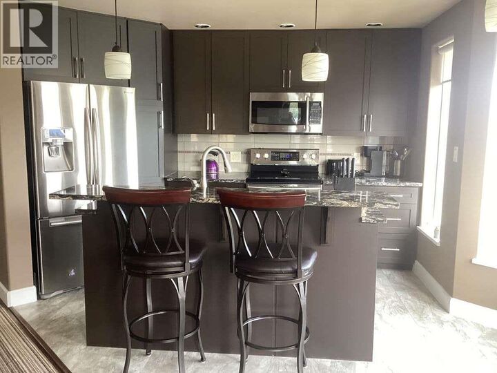 Property Photo: 1947 Underhill Street 801 BC V1X 7Z5