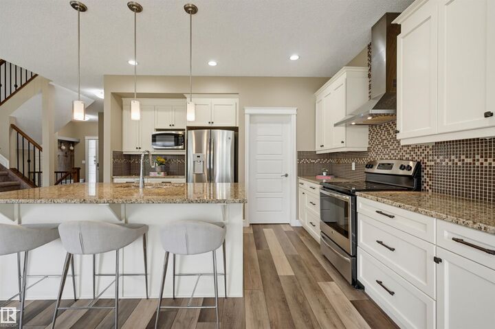 Property Photo:  7836 19 Avenue SW  AB T6X 1W1 