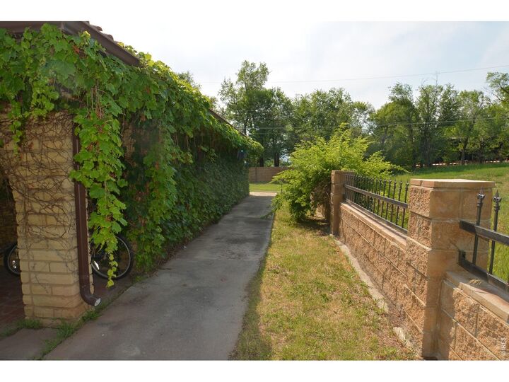 Property Photo:  10110 W 73rd Pl  CO 80005 