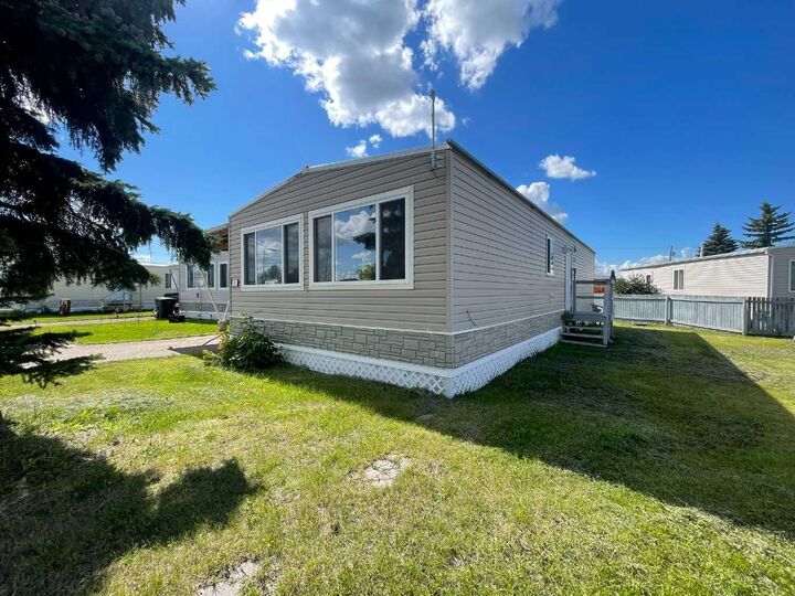 Property Photo:  5308 57 Street 80  AB T9V 2A3 