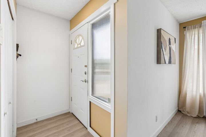 Property Photo:  212 Whitman Place NE  AB T1Y 4H9 