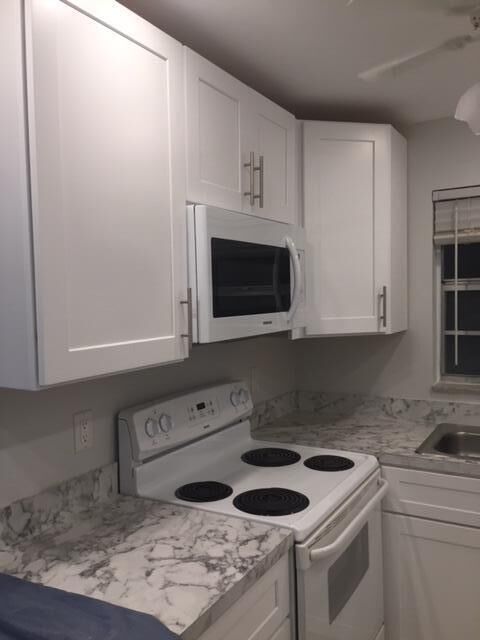 Property Photo:  1271 NW 13th Street 357E  FL 33486 