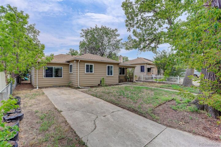 Property Photo:  1664 Ironton Street  CO 80010 