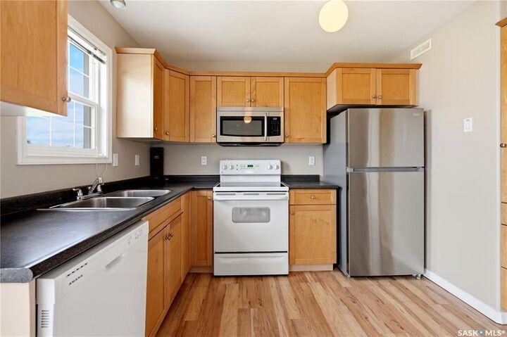 Property Photo:  118 Pawlychenko Lane 52  SK S7V 1K1 