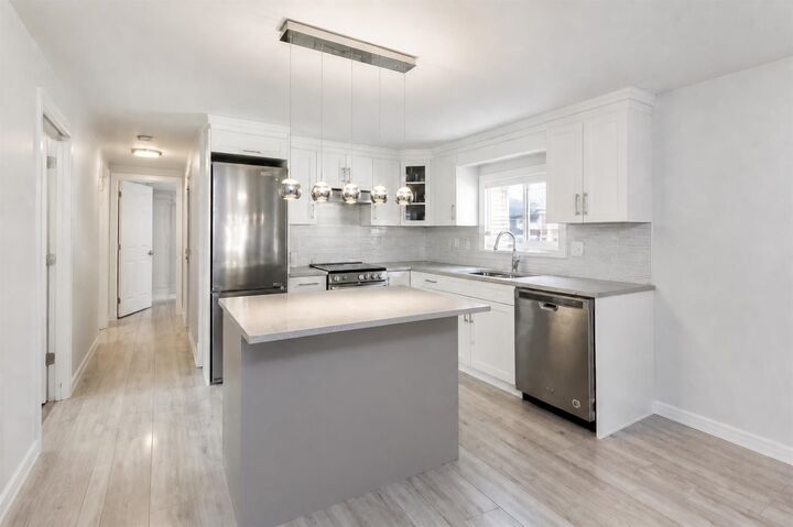 Property Photo: 1840 160 Street 221 BC V3A 4X4