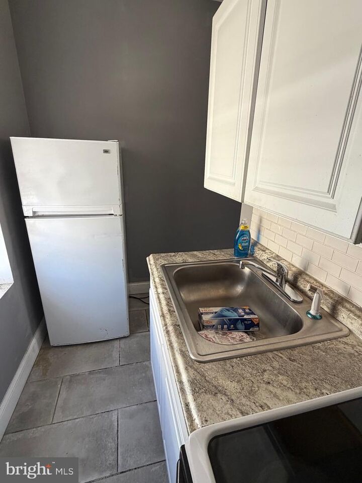 Property Photo:  233 E Mayfield Street  PA 19134 