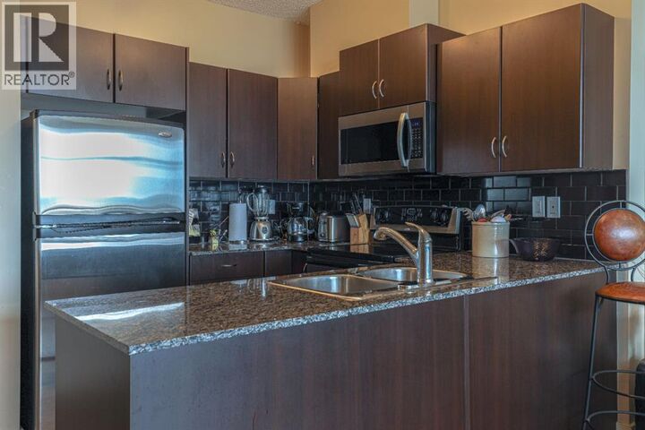 Property Photo: 11811 Lake Fraser Drive Southeast AB T2J 7J4