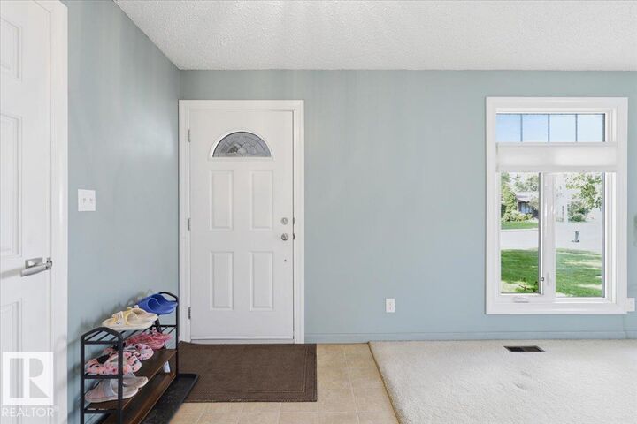 Property Photo:  128 Green Ash Drive  AB T9A 2H8 