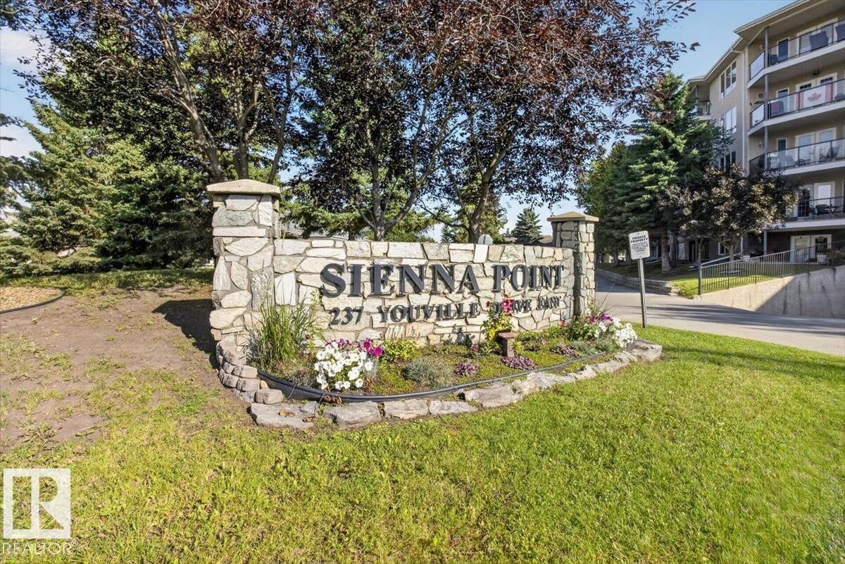 Property Photo: 237 Youville Drive NW 116 AB T6L 7G2